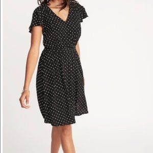 Waist defined, v-neck polka dot dress